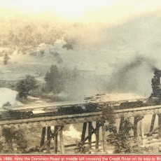 WORKING LOCOMOTIVE ON WOOD TRESTLE BRIDGE